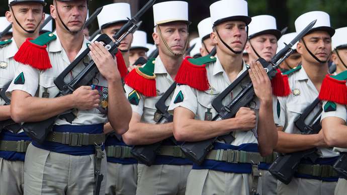 Soldiers parade French Foreign Legion Paris Bastille